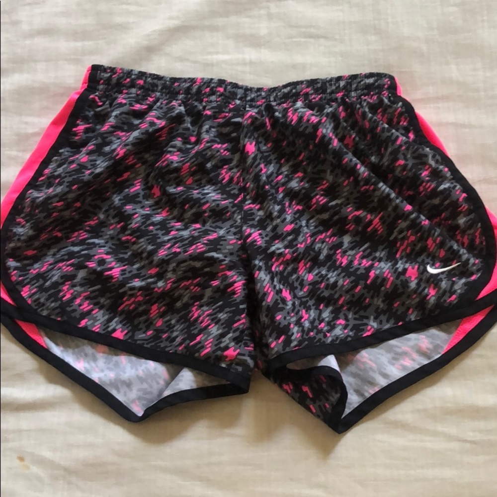 Nike track shorts.